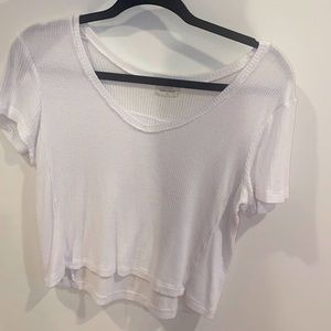 Size XL (sizing is weird, would fit S/M/L) White cropped (ish) top